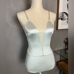 Out from under one piece top size L